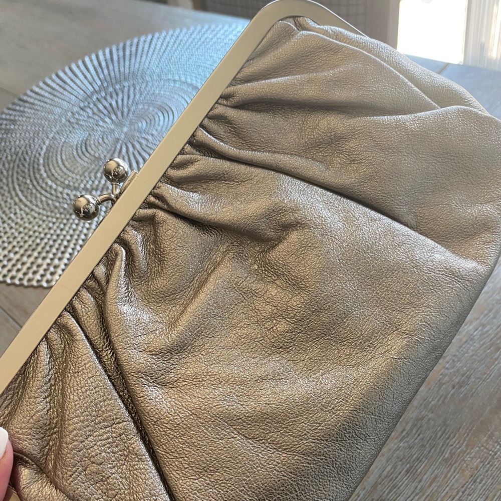 Metallic gold express clutch - never used